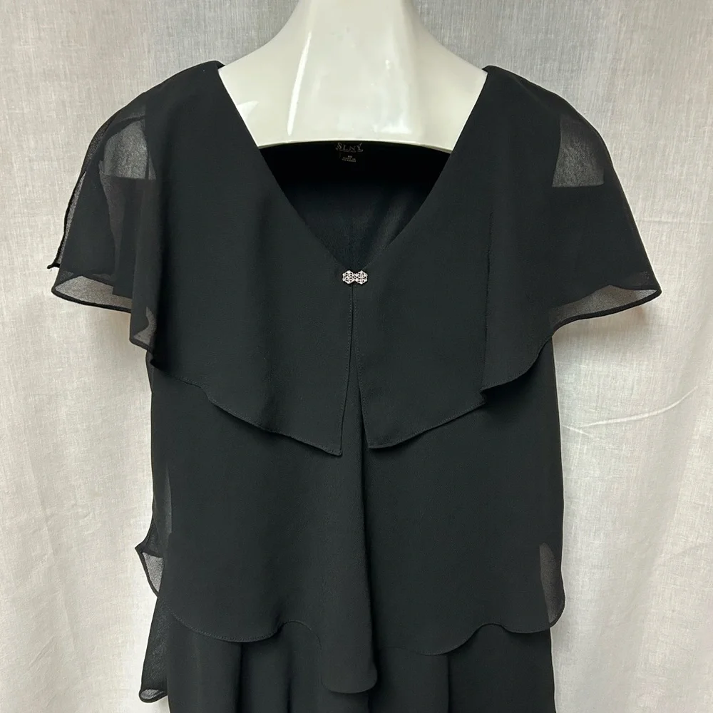 Black tiered sassy dress 
Cruise 
Hem 40” 23” armpit to armpit flat 
Size 18 - Picture 2 of 13